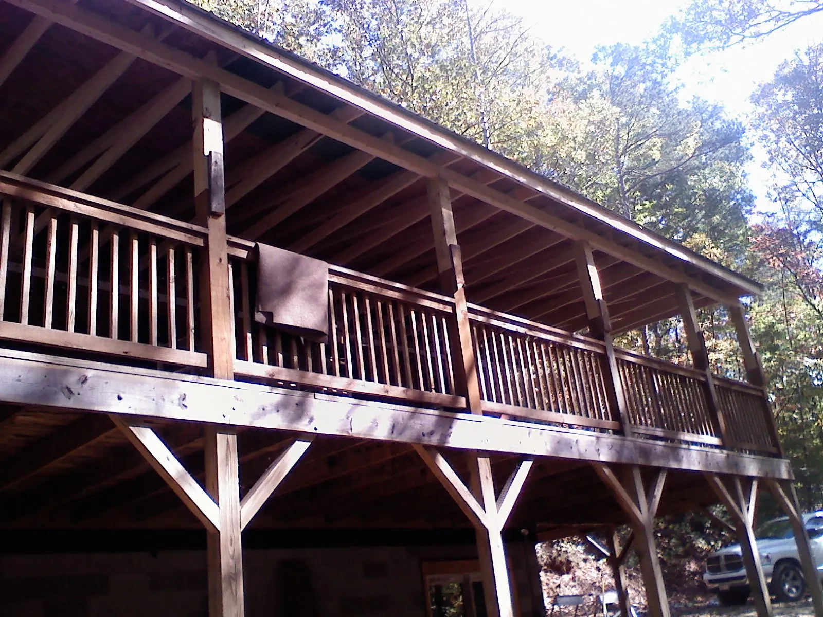 Timber framing under a new elevated porch and deck in Park